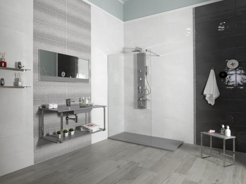 Modern walk in shower room with grey and white tiles