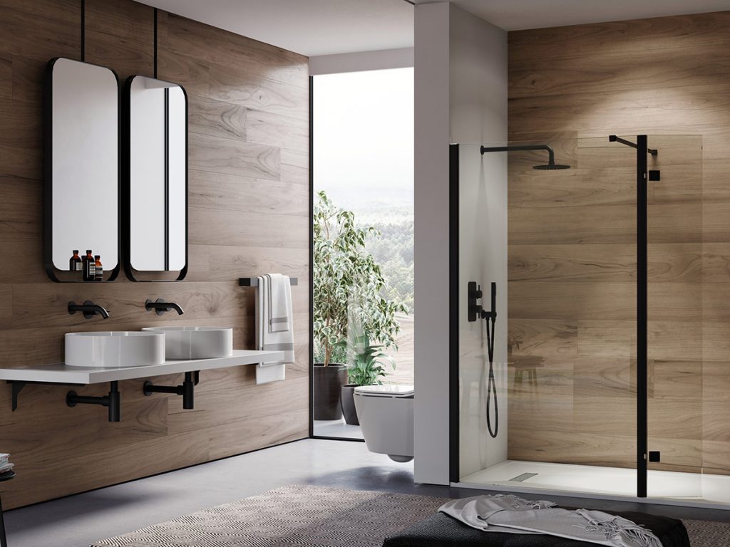 Saneux bathroom dislpay showing black taps, showers & shower enclosures