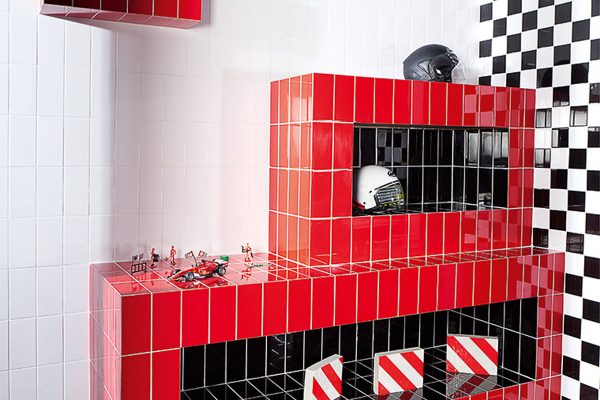 Red & Black metro tiles used to create a shelf for some F1 memorabilia