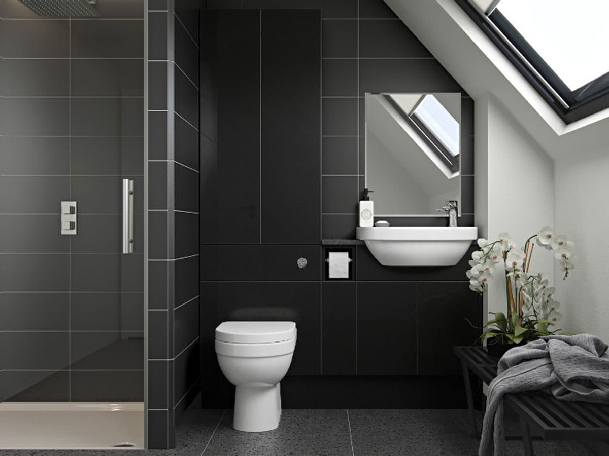 a modern bathroom suite with a velux window and black cabinets