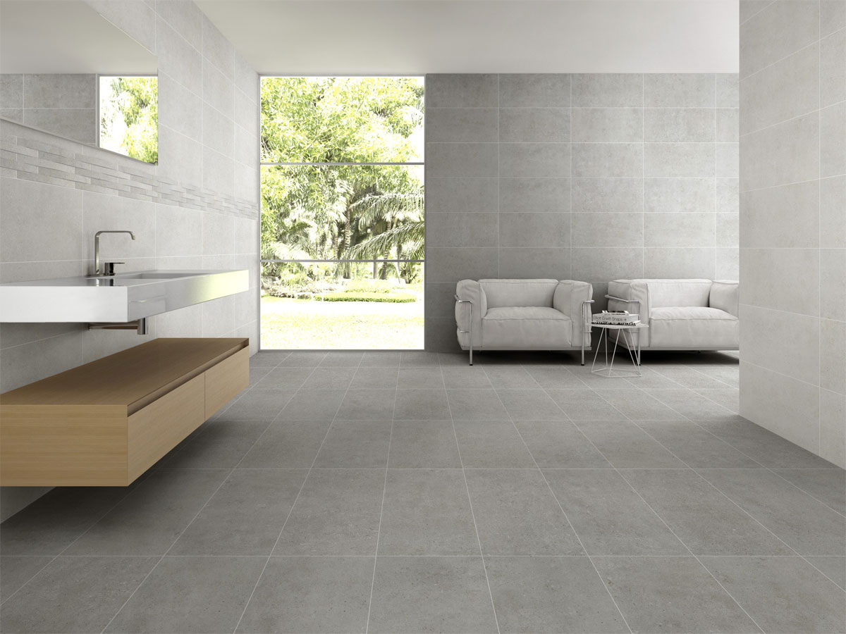 designer washroom with a large window and grey wall and floor tiles