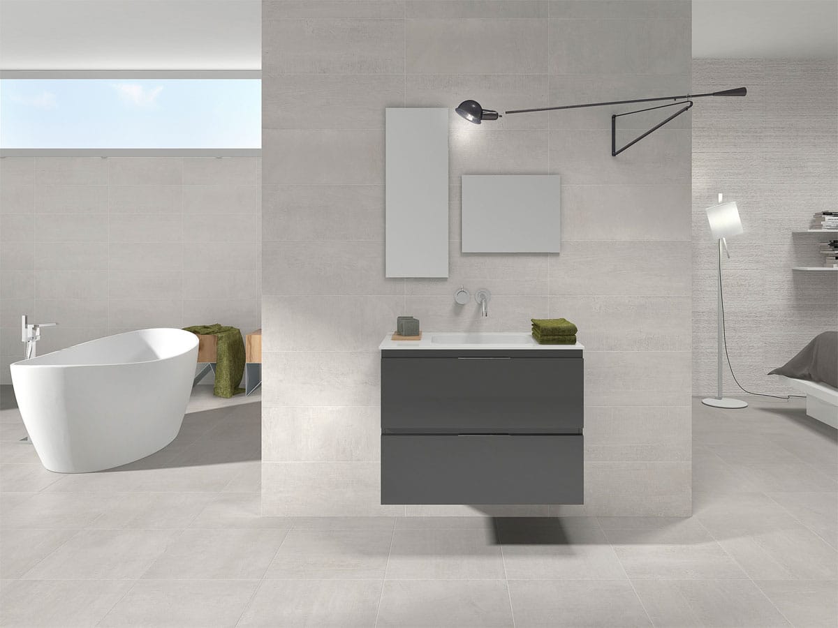 modern grey bathroom with a freestanding bath