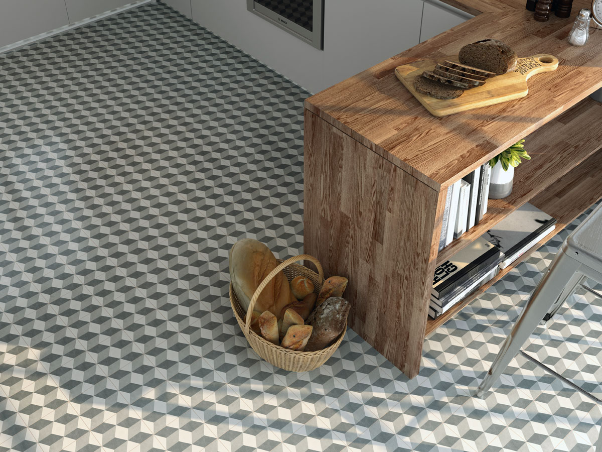 geometric tiled kitchen floor with natural wood breakfast bar
