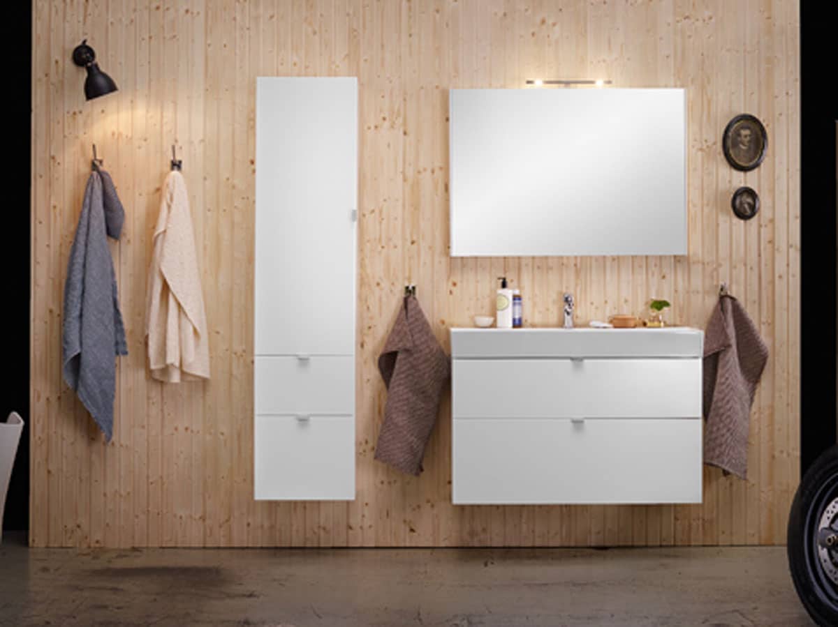 white basin unit with 2 drawers and a tall unit for storage