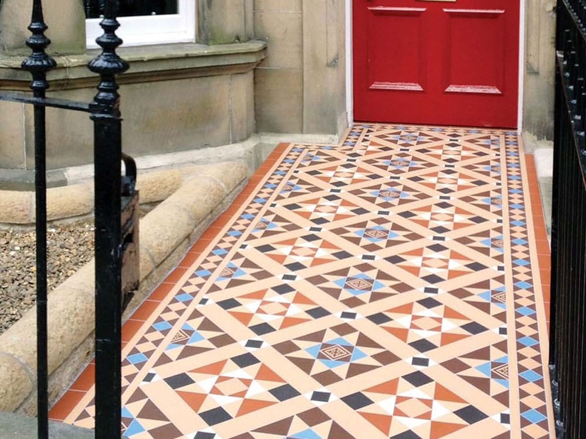 forecourt path laid in Victorian floor tiles with matching border