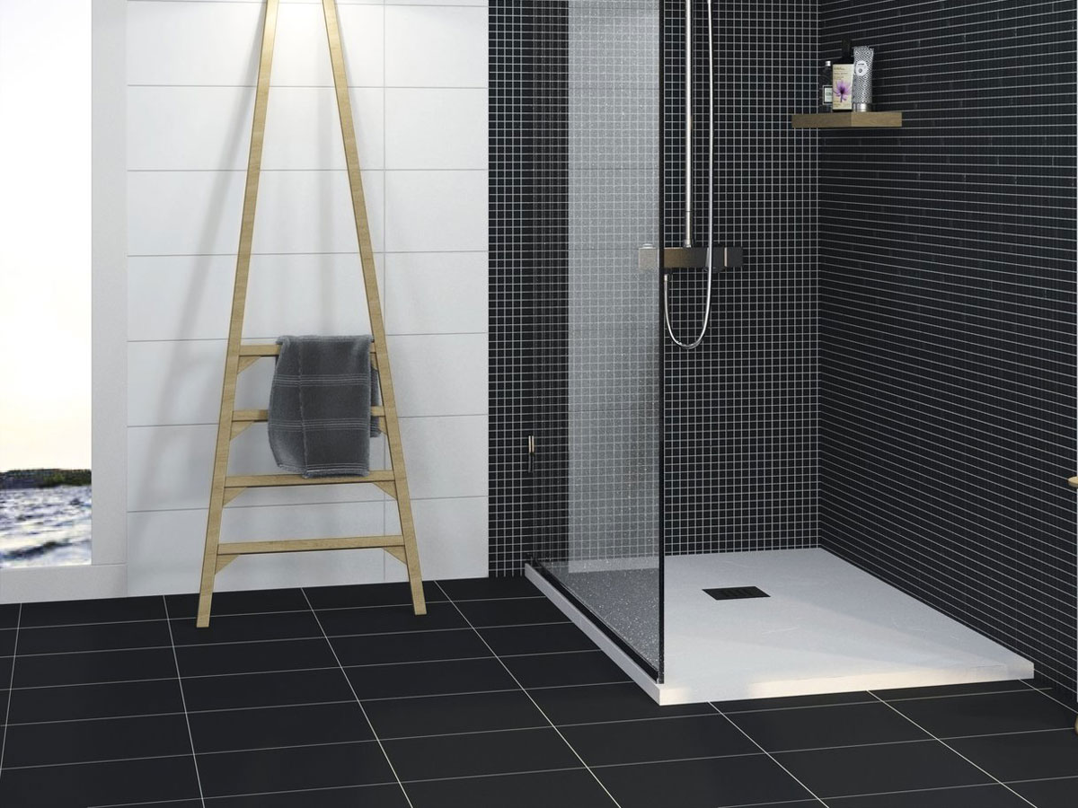 walk in shower using monochrome black and white tiles