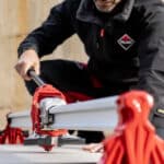 Image showing the rubi rs manual cutter being used to cut tiles